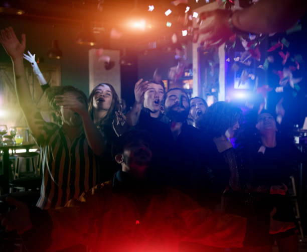 istock Audience dancing in concert 1208175271