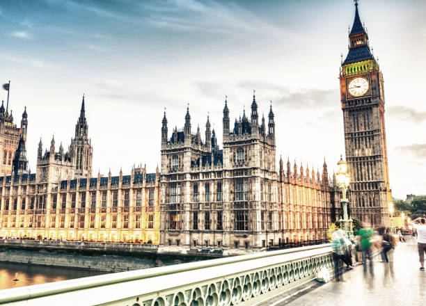 istock Westminster Bridge by night, London. Vintage scene 1208175323