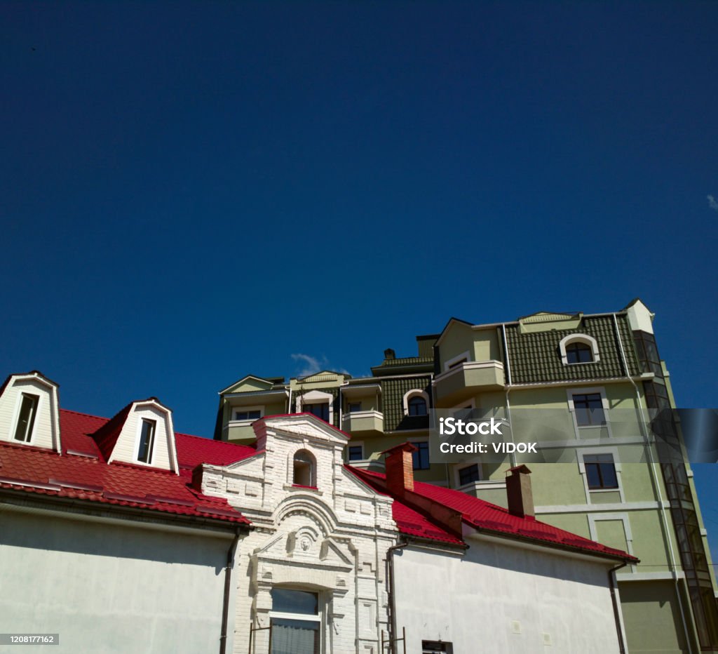 Multi-storey buildings with green and red roof in Vinnitsa, Ukraine. This image was taken with a mobile phone. Vinnytsia Stock Photo