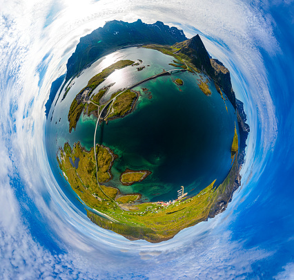 Mini planet Lofoten is an archipelago in the county of Nordland, Norway. Fredvang Bridges Panorama.