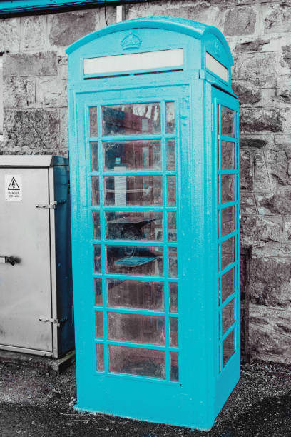 Blue telephone booth in the Scottish Highlands. This is the true colour, not a post processing effect.