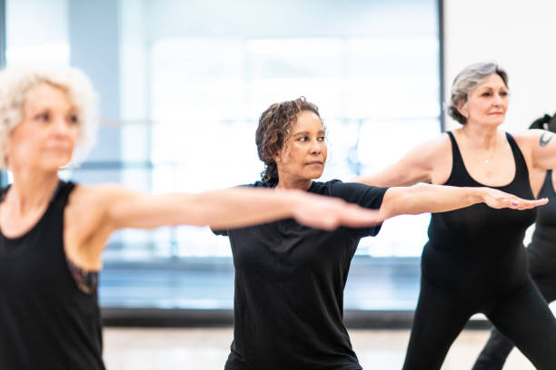 istock Women's Yoga Class stock photo 1208181282