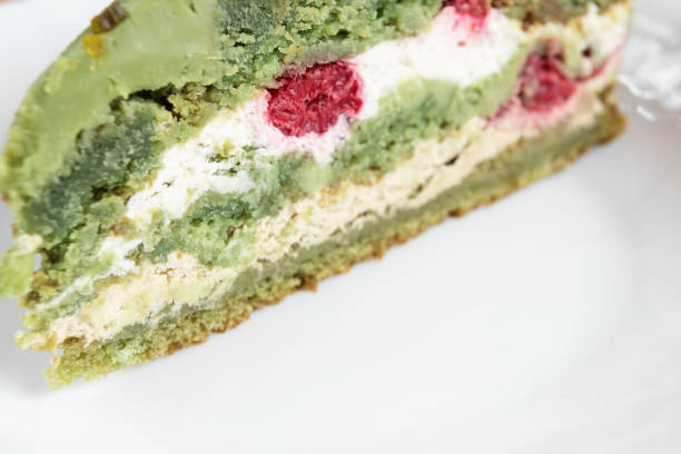 istock Cake with pistachios and raspberries 1208183844