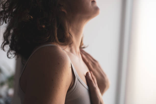 Woman hands touching her body close up, Embodiment, Feldenkrais Method and Awareness through movement Woman hands touching her body close up, Embodiment, Feldenkrais Method and Awareness through movement womens issues stock pictures, royalty-free photos & images