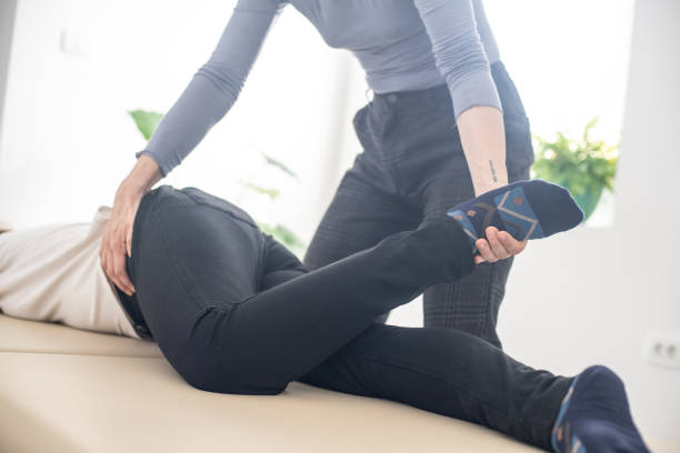 istock Woman practicing Somatic movement in her Health Studio, Awareness through movement, embodiment and Feldenkrais Method 1208187312