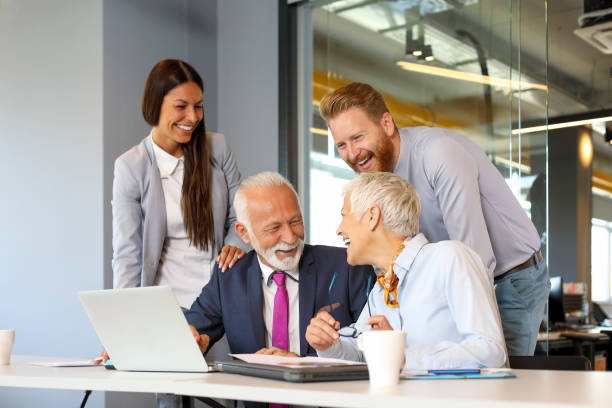 istock Business people talking in the office. 1208189735