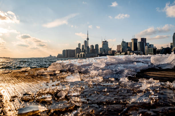istock Blurry Toronto Skyline Behind Ice at Polson Pier 1208195089