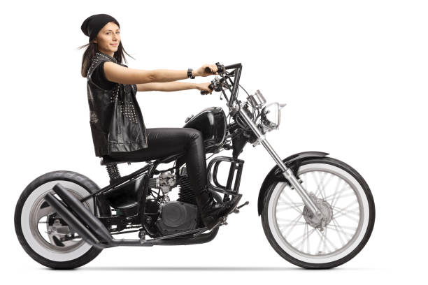 istock Female biker on a custom black chopper 1208195528