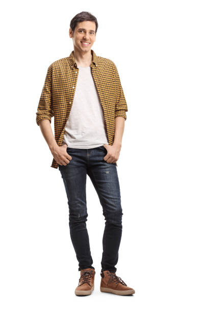 istock Young casual guy in a shirt posing 1208197376