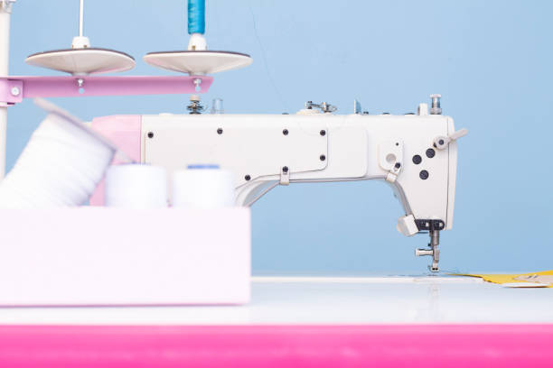 istock sewing Studio. sewing machine. A set of items for needlework: threads, needles, pins, tape measure, etc. 1208200585