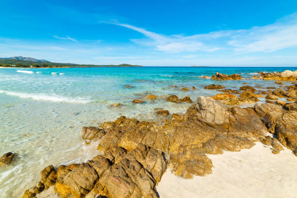 istock Rocks and sand in Rena Bianca beach in Sardinia 1208203138
