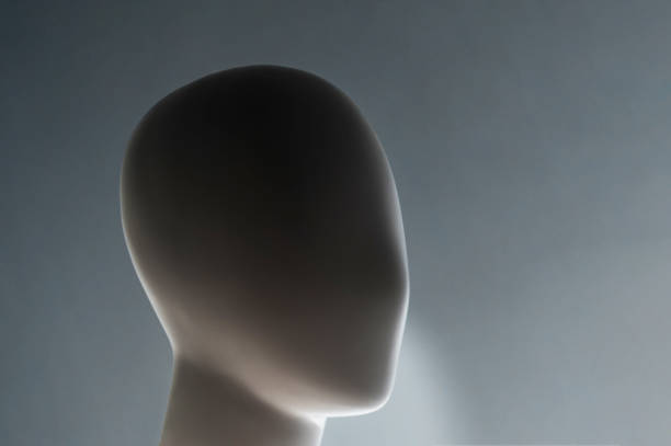 istock dark close-up of a plastic mannequin head 1208203174