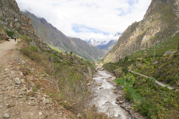 istock River flowing Through a Rocky Mountainous Valley 1208204105