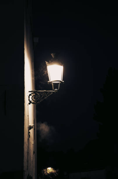 istock Street lamp lit at night 1208205431