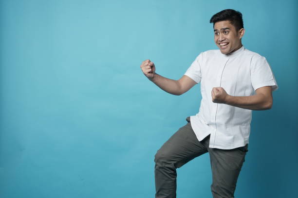 istock Success Happy Southeast Asian Young Man - Copy Space 1208205776