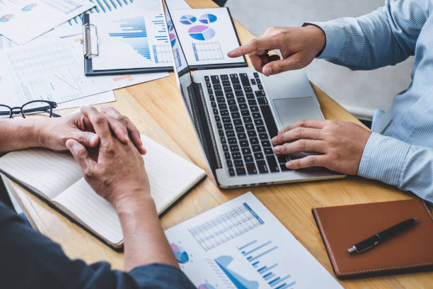 istock Business team collaboration discussing working analyzing with financial data and marketing growth report graph in team, presentation and brainstorming to strategy planning making profit of company 1208208533