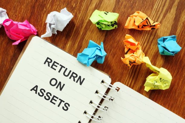 istock Text sign showing hand written words Return on Assets ROA 1208209546