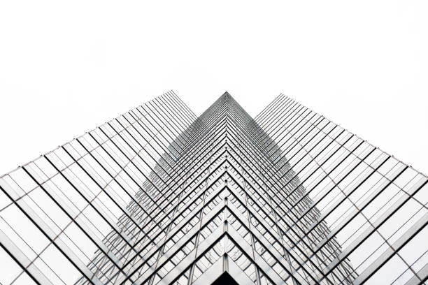 istock Low angle view of modern office building, skyscrapers, white background with copy space 1208210872