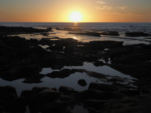 istock Sunset over the tide pools 1208212282