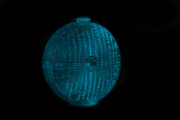 istock Round shape blue plastic lights in black background 1208214217