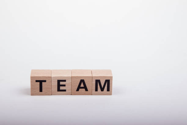 istock World TEAM build be wooden blocks 1208216365