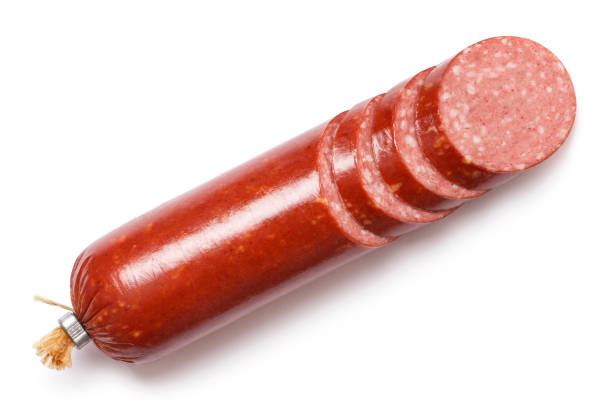 istock Sliced salami smoked sausage on white 1208223983