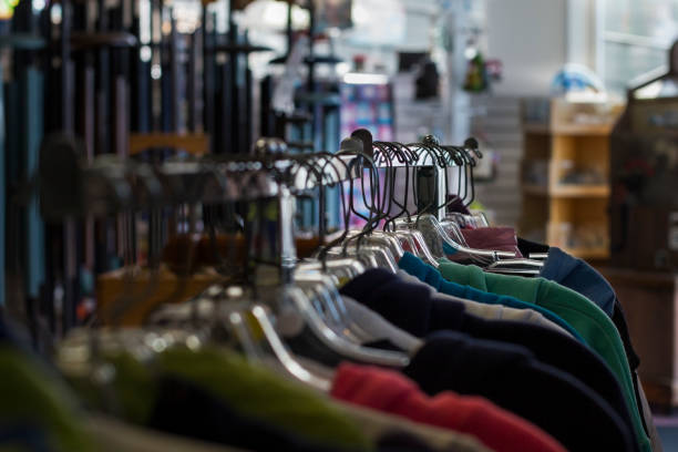 istock Hangers with clothes for sale 1208227440