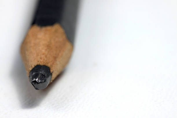 istock Graphite wooden pencil on an isolated white background 1208227597