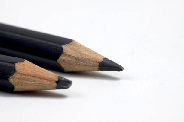 istock Graphite wooden pencil on an isolated white background 1208227632