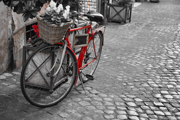 istock Red Color Bicycle on the street. 1208227888