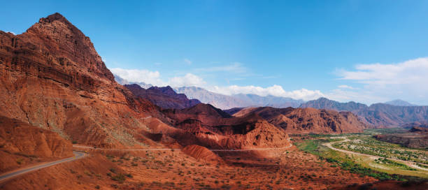 istock Widescreen view on the red mountains of Argentina 1208232968