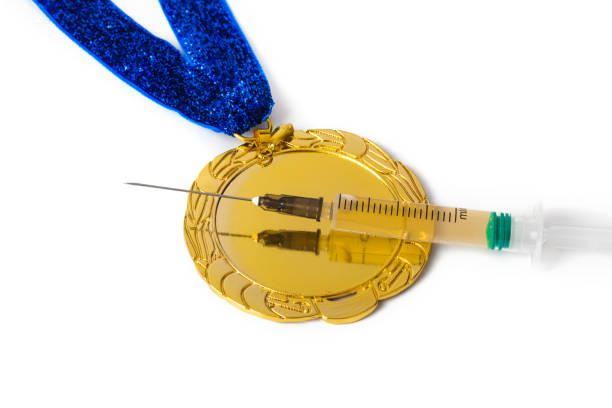 istock Gold medal and syringe 1208234580