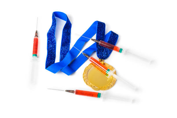 istock Gold medal and syringes 1208234589