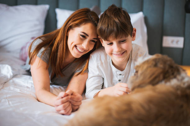 istock Mother taking a nap with her son. 1208234661