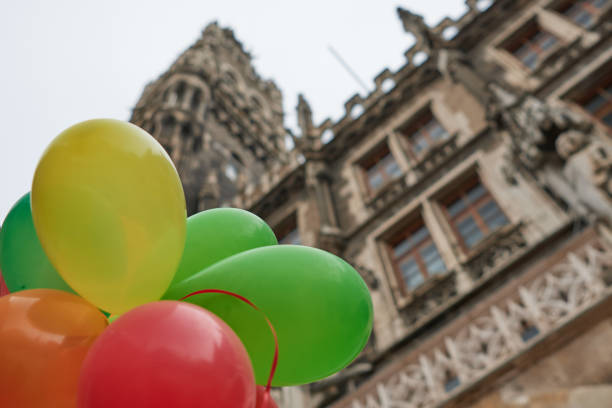 Munich, Germany - February 23, 2020: the carnival season is a popular event in Munich and starts already on Sunday with street animations, stands and live music at Marienplatz. Ballons are a part of the tradition.