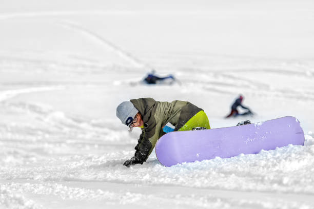 A family day of sliding in the mountains in winter, Quebec, Canada