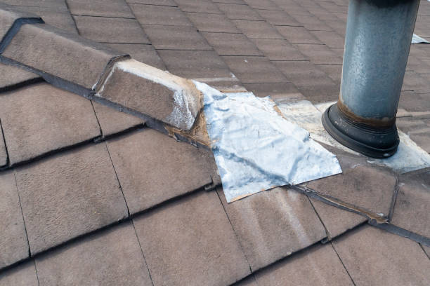 istock Brown tiles on a residential roof 1208236495