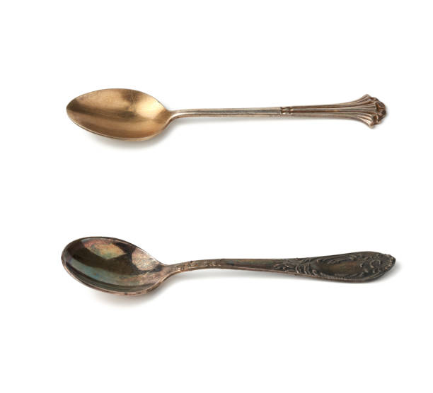 istock silver vintage small coffee spoon for pouring sugar isolated on a white background 1208236613