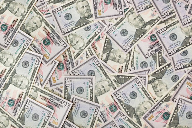 istock Dollars background - business money texture 1208238049