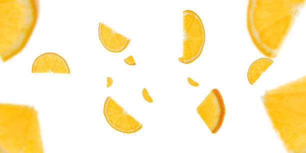istock Sliced fruit falling background. Orange citrus tangerine flight in air with clipping path. 1208238329