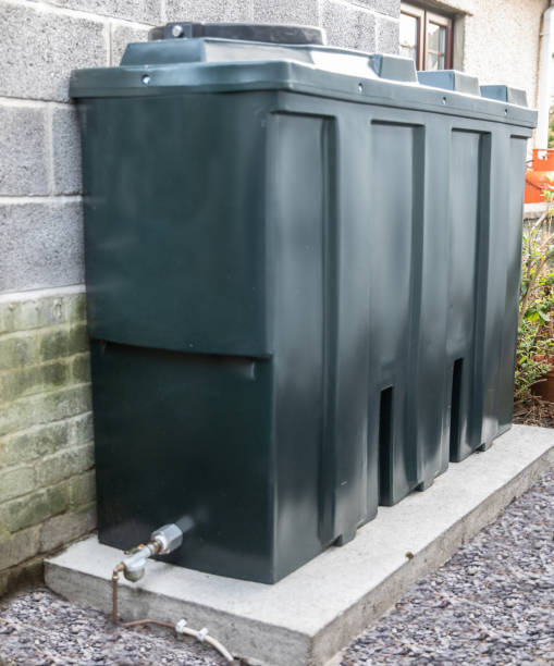 istock Central heating oil green plastic tank with internal bund and concrete base and isolation valve 1208238406