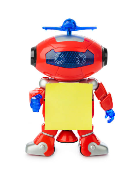 istock Toy robot with blank paper 1208240302