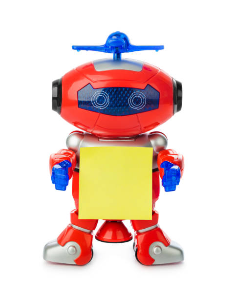 istock Toy robot with blank paper 1208240534