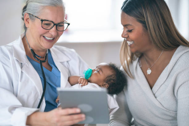 istock Baby wellness appointment with doctor 1208244878