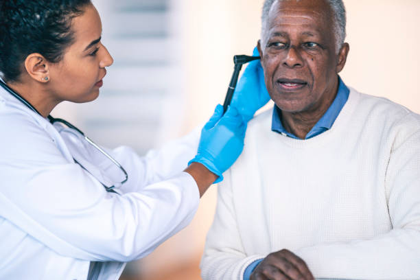 istock Senior man at doctor's appointment 1208245014