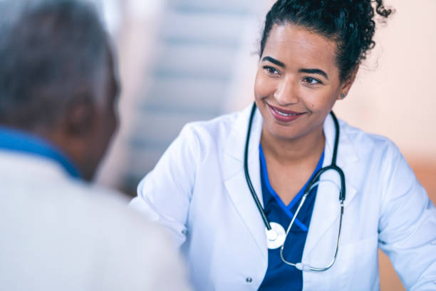 istock Female doctor consulting patient 1208245018