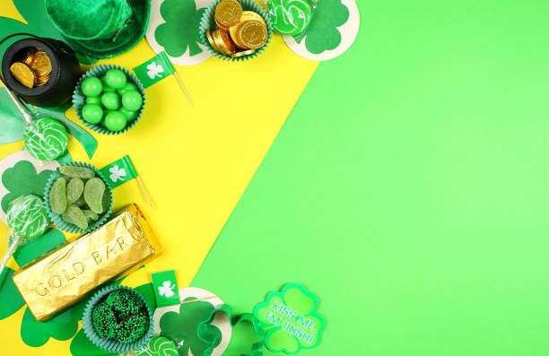 istock St Patrick's Day flat lay with chocolate coins, leprechaun hat and shamrocks. 1208245127