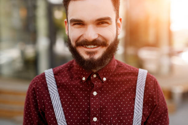 istock Cheerful waiter smiling for camera 1208245634
