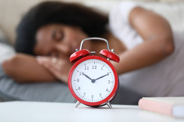istock African-american female peacefully sleeping 1208245648