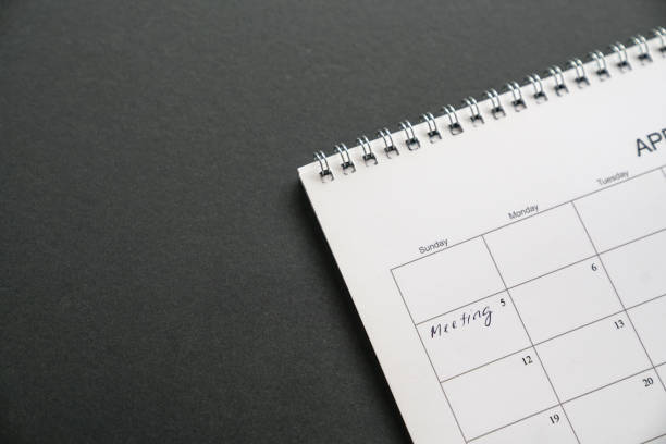istock Calendar with meeting written next to a date 1208249330